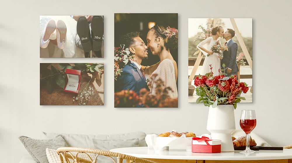 romantically styled gallery wall display using canvas prints in a dining room setting