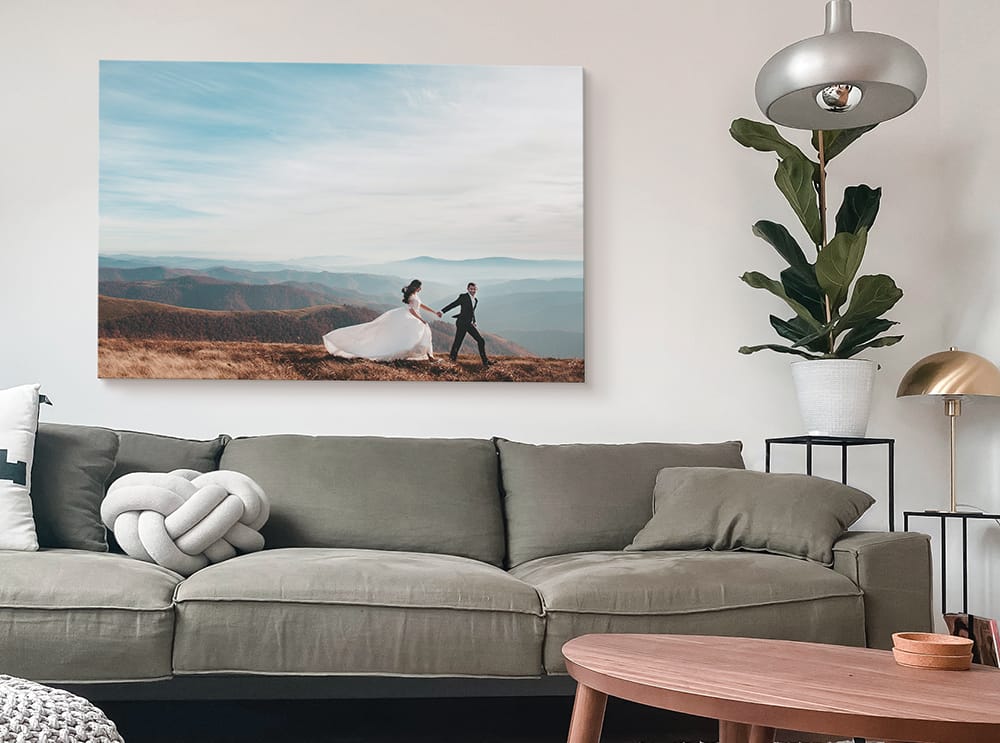 light and airy landscape canvas print of couple in open mountains making room feel brighter