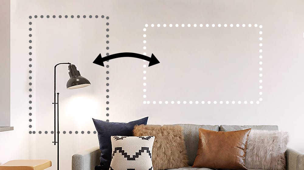 Vertical and horizontal wall-art outlines above a sofa illustrating how either orientation could fit the room.