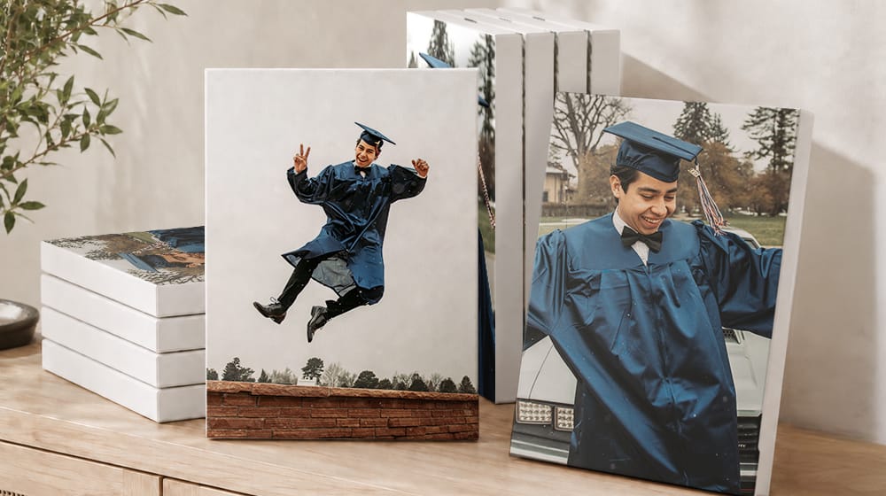 Ten canvas prints with white edges featuring graduation portraits, including a graduate jumping in his cap and gown.