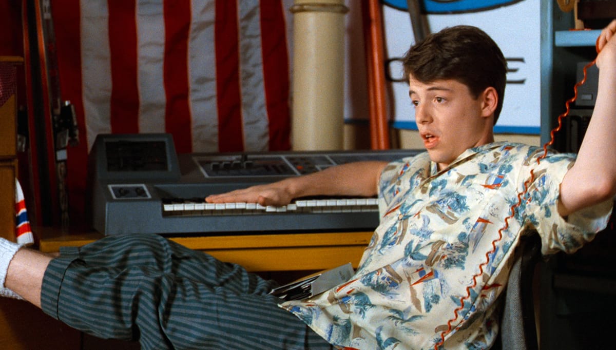 Ferris Bueller in his bedroom.