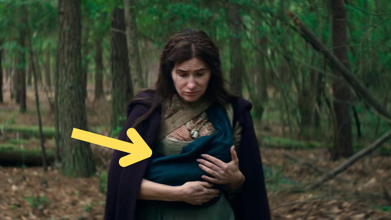 Agatha cradling Nicky as a baby