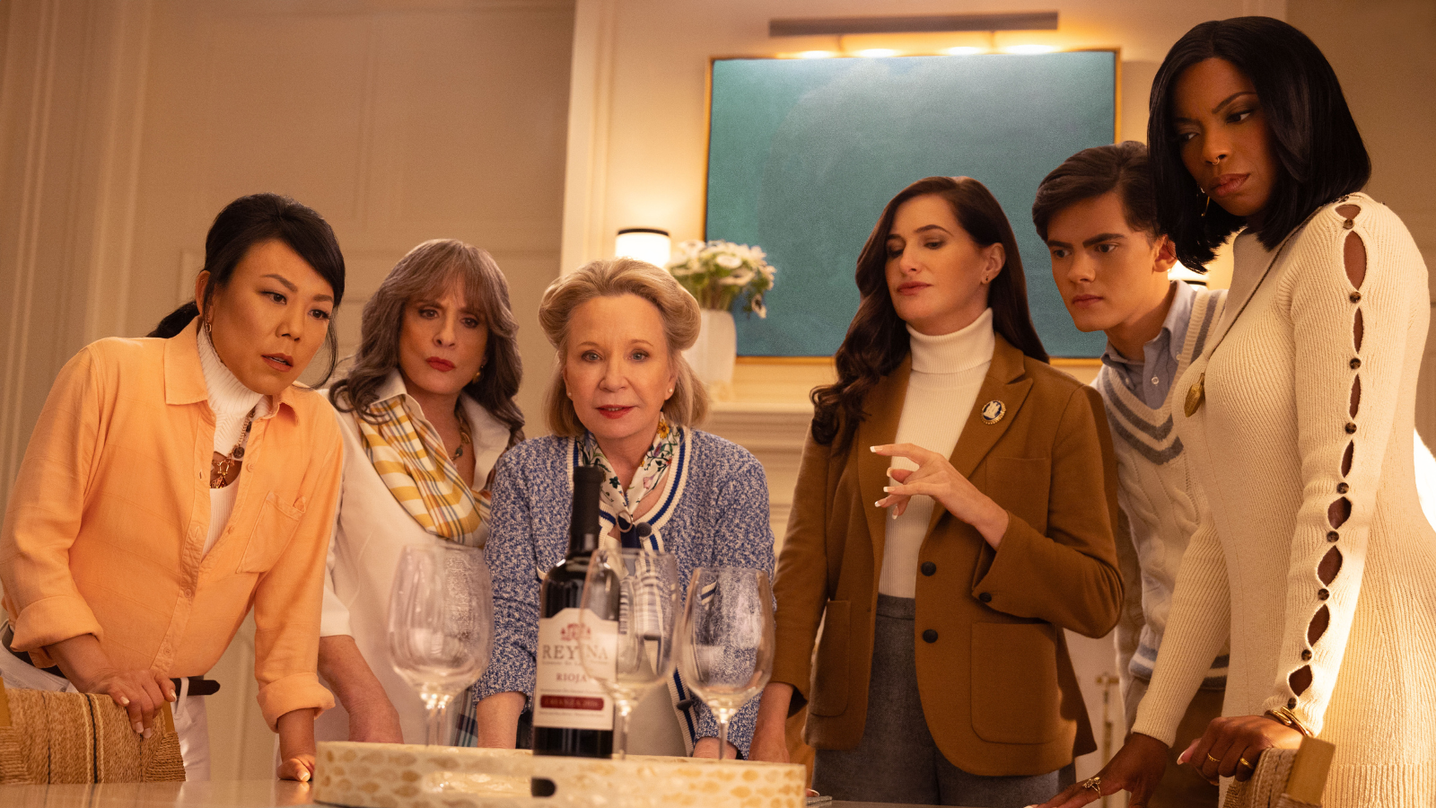 A picture of the entire coven in the first trial. Sharon is in the center wearing a blue shirt with a floral pattern.