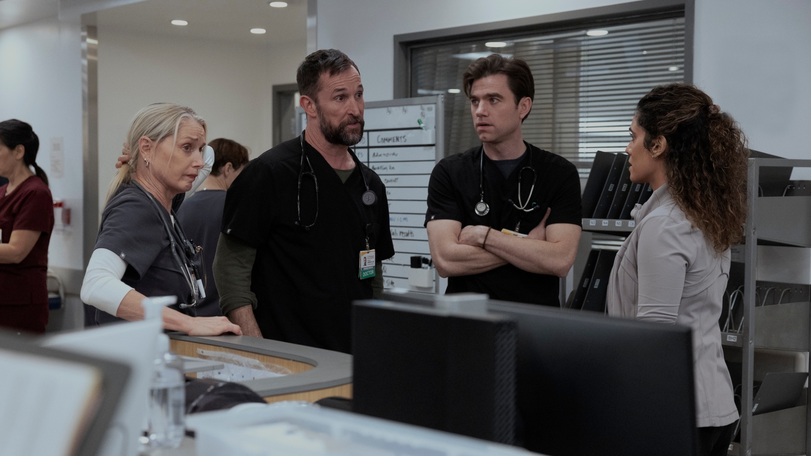 Dana, Robby, Langdon, and Al-Hashimi. Al-Hashimi does not match them in the colors or style of clothing.