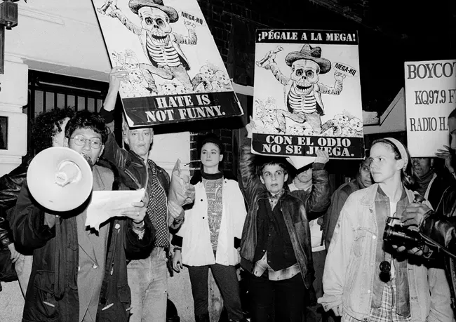 Ana Maria Simo (second from right) participates in an action with the Lesbian Avengers, working in coalition with Las Buenas Amigas (a Latina lesbian group) and African Ancestral Lesbians United for Social Change.&nbsp;The action opposed a homophobic, racist Spanish-language station. Courtesy of The Lesbian Avengers. Photo by Morgan Gwenwald. All Rights Reserved.