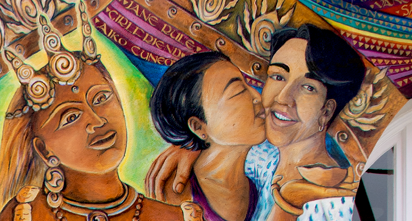 MAESTRAPEACE, detail of lesbian couple, mural on The San Francisco Women's Building, 18th and Valencia Streets. Juana Alicia, Edythe Boone, Miranda Bergman, Susan Cervantes, Meera Desai, Yvonne Littleton and Irene Perez, © 1994, 2000, 2010. All rights reserved. Mural images courtesy of the artists.