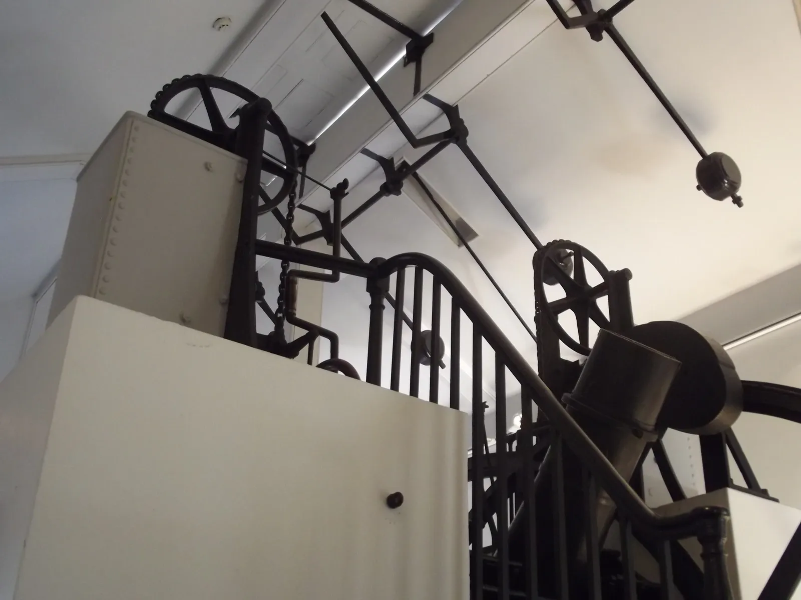 The Airy transit telescope mounted between supports beneath the observing-room roof at Greenwich