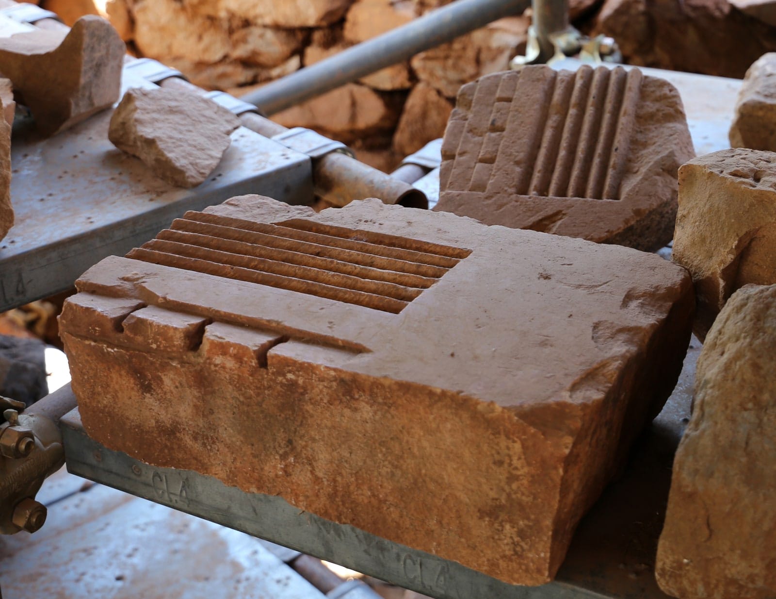 Carved stone architectural fragments at Grat Be’al Gibri, Yeha.