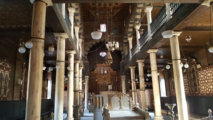 The Ben Ezra Synagogue interior with marble columns, balconies and an ornate ark