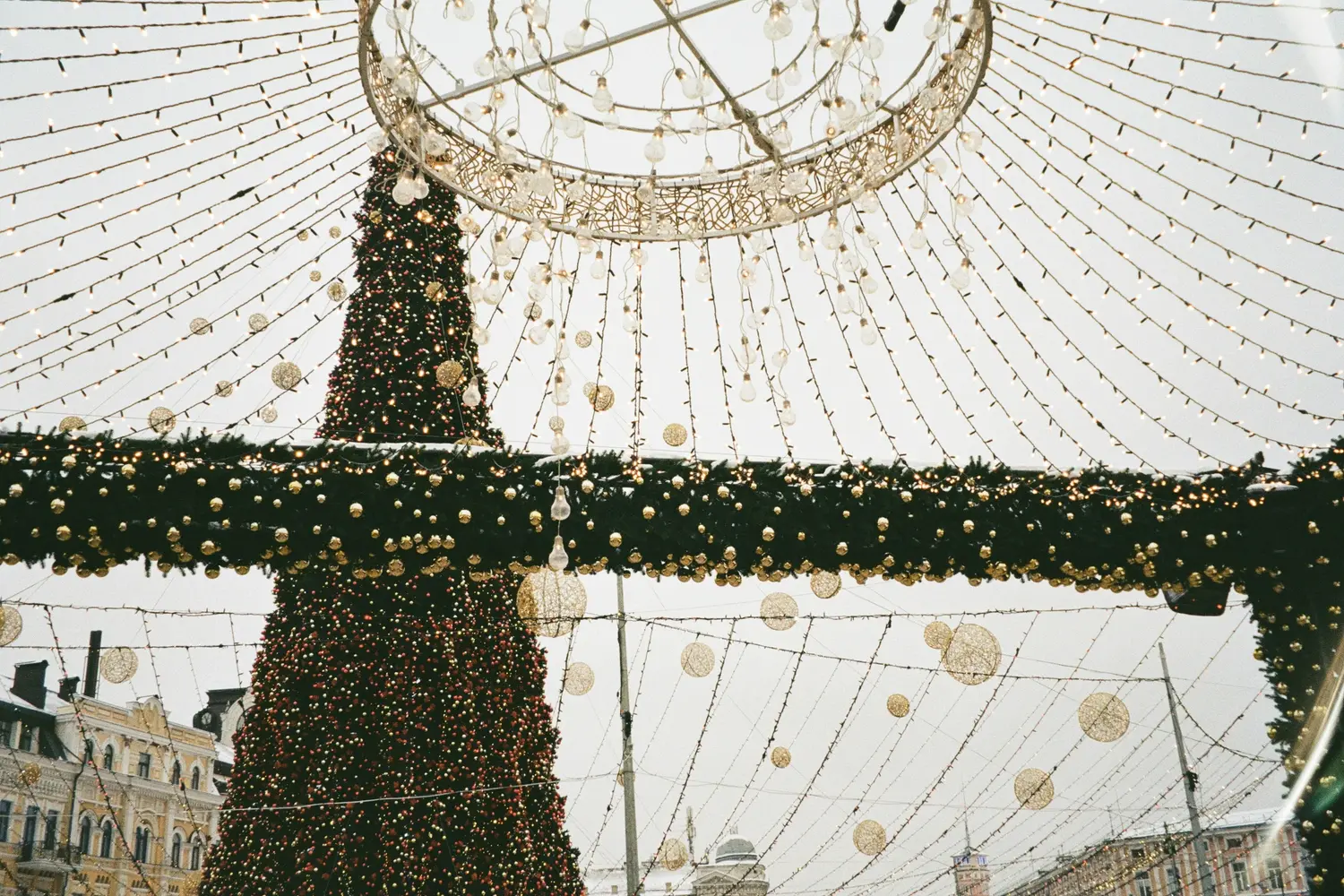 festive holiday decorations and central Christmas tree on Sophia Square in Kyiv, Ukraine