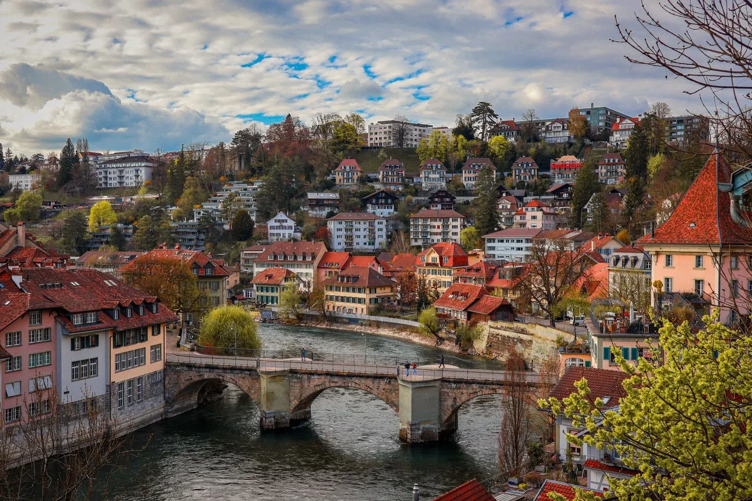 Aerial view of Bern, Switzerland featuring the Nydeggbrücke bridge over the Aare River