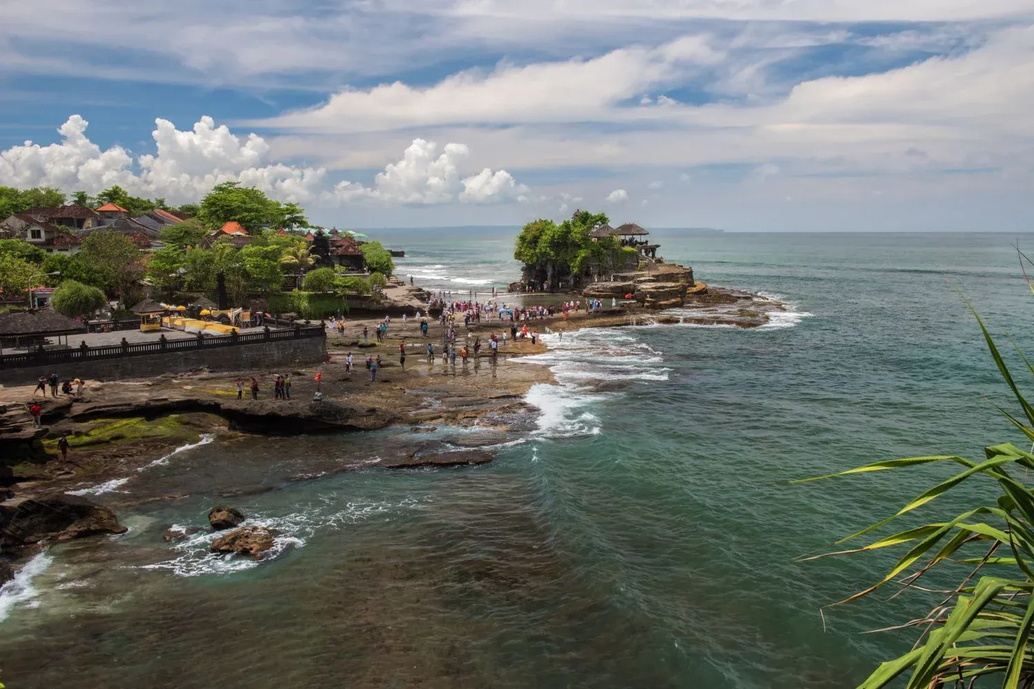 Tanah Lot Temple surrounded by the ocean in Bali, Indonesia