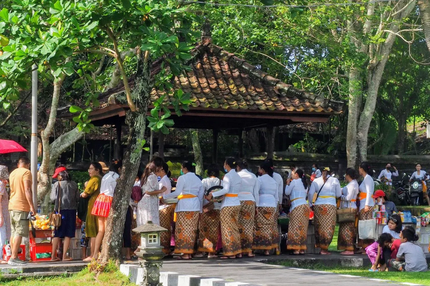 Women in traditional attire gather for a cultural event in Bali, Indonesia