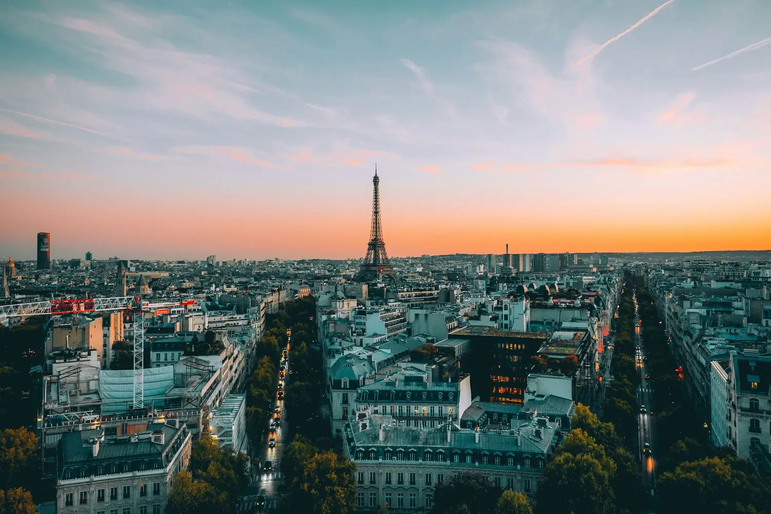 Eiffel Tower and the Parisian skyline at sunset