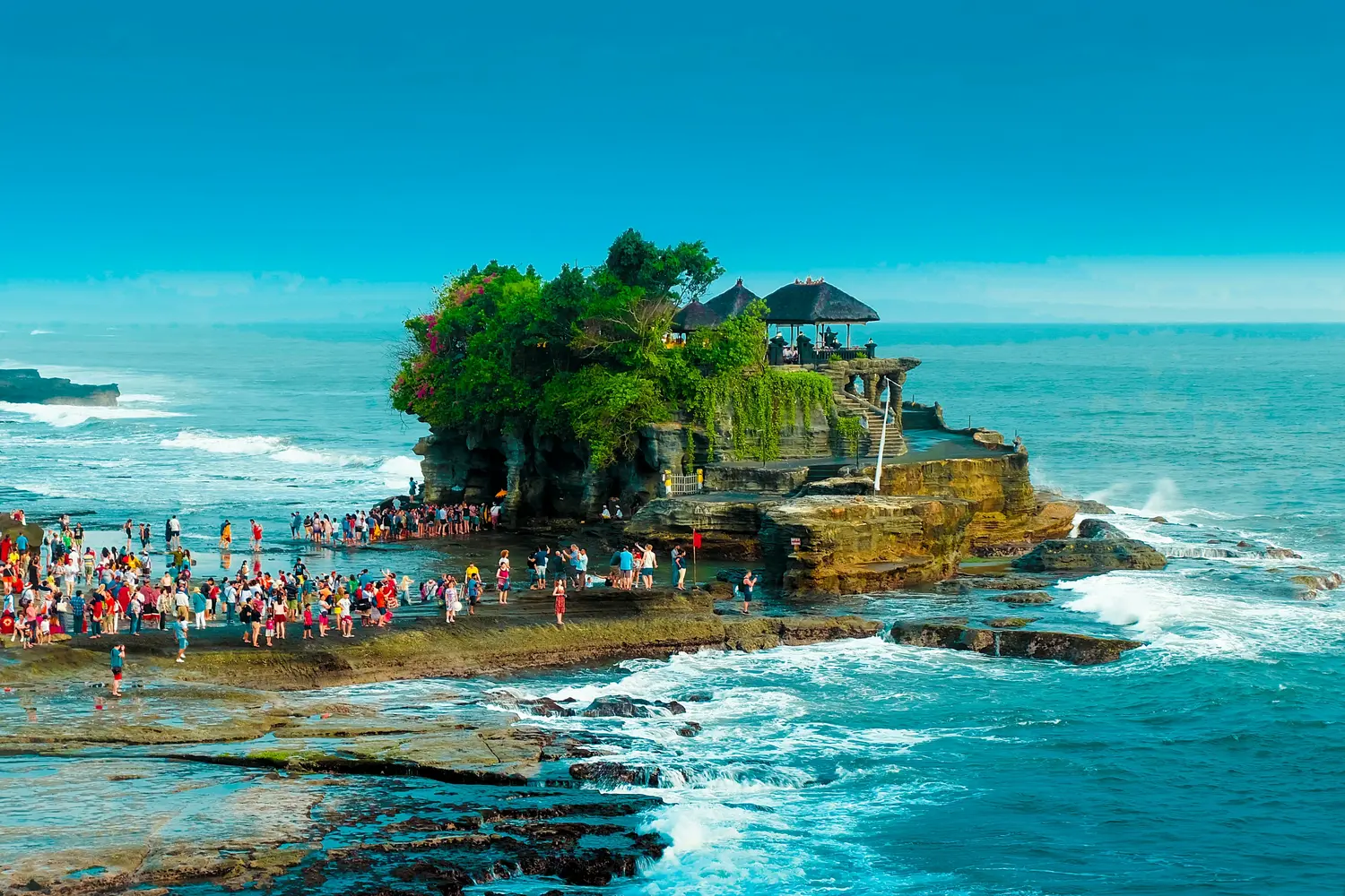 Tanah Lot Temple, a famous Hindu sea temple located on a rock formation off the coast of Bali, Indonesia