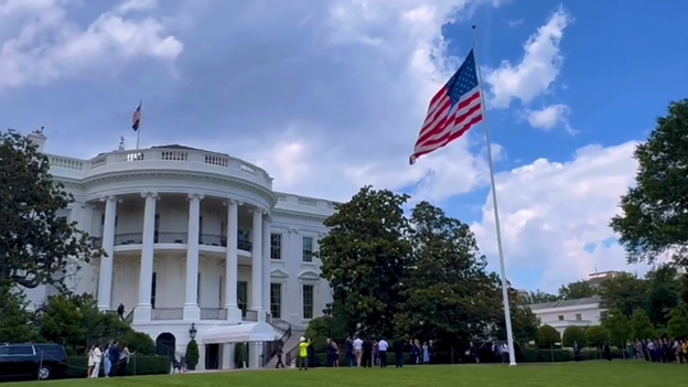 Two huge, real American flags unfurled at the White House