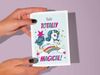 Printable unicorn friendship card for kids with quote, "you're totally magical!" Blue background.