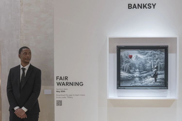 La obra 'Niña con globo', de Banksy, vendida por 17.9 millones de dólares en Nueva York