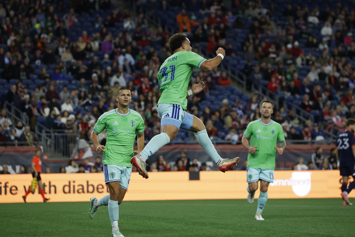 Seattle Sounders midfielder Hassani Dotson fist-pumps after scoring the opening goal against the New England Revolution on Saturday, Oct. 10, 2026 at Gillette Stadium in Foxborough.