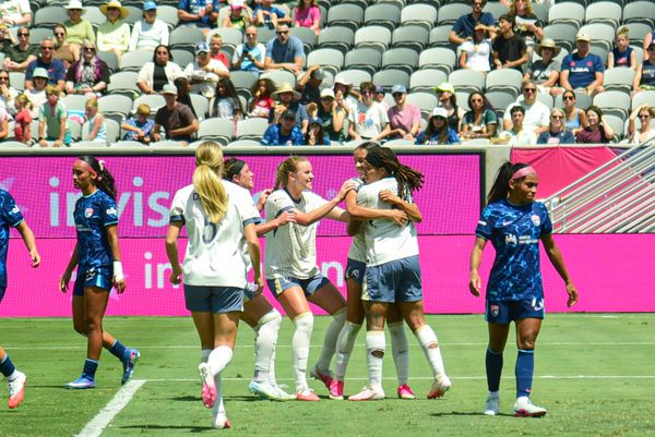 Dickey Stars in Return as Reign Hold Off Wave for Quality Road Win