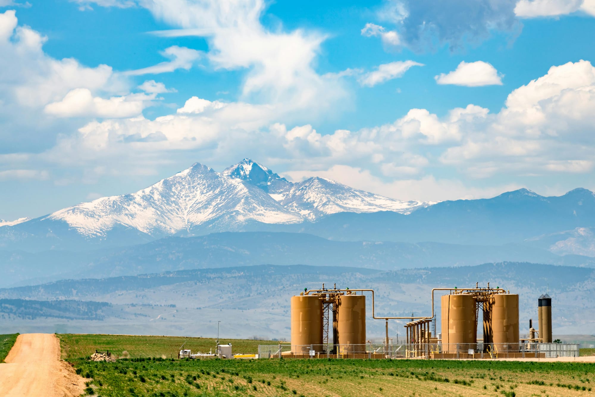 Industrial Plant near Snow Capped Mountains