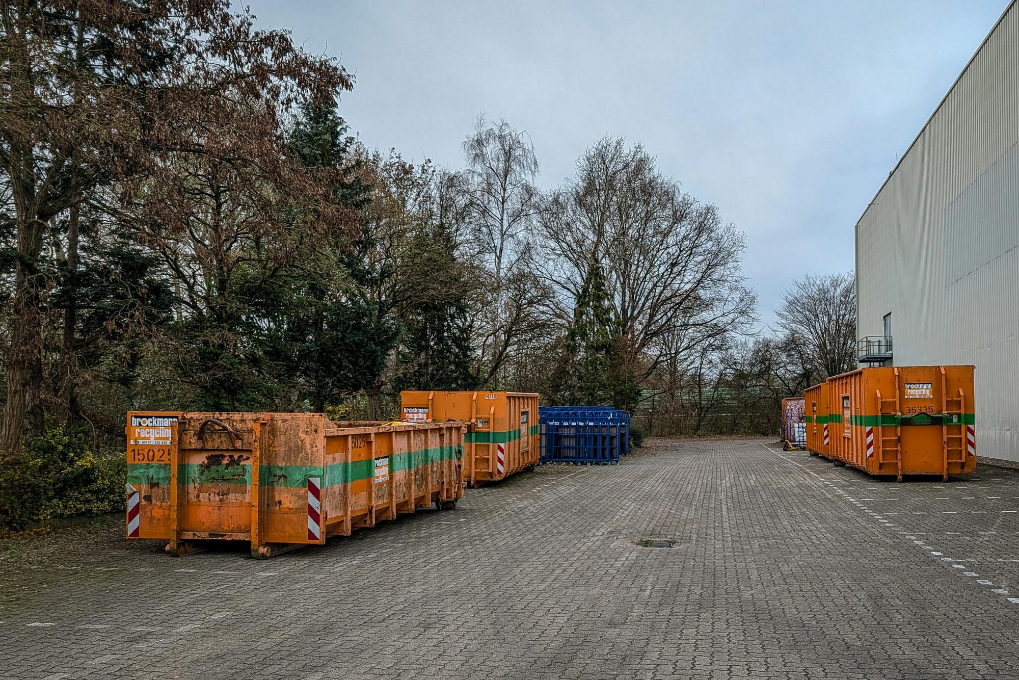 Industrial Waste Bins in Outdoor Storage Area
