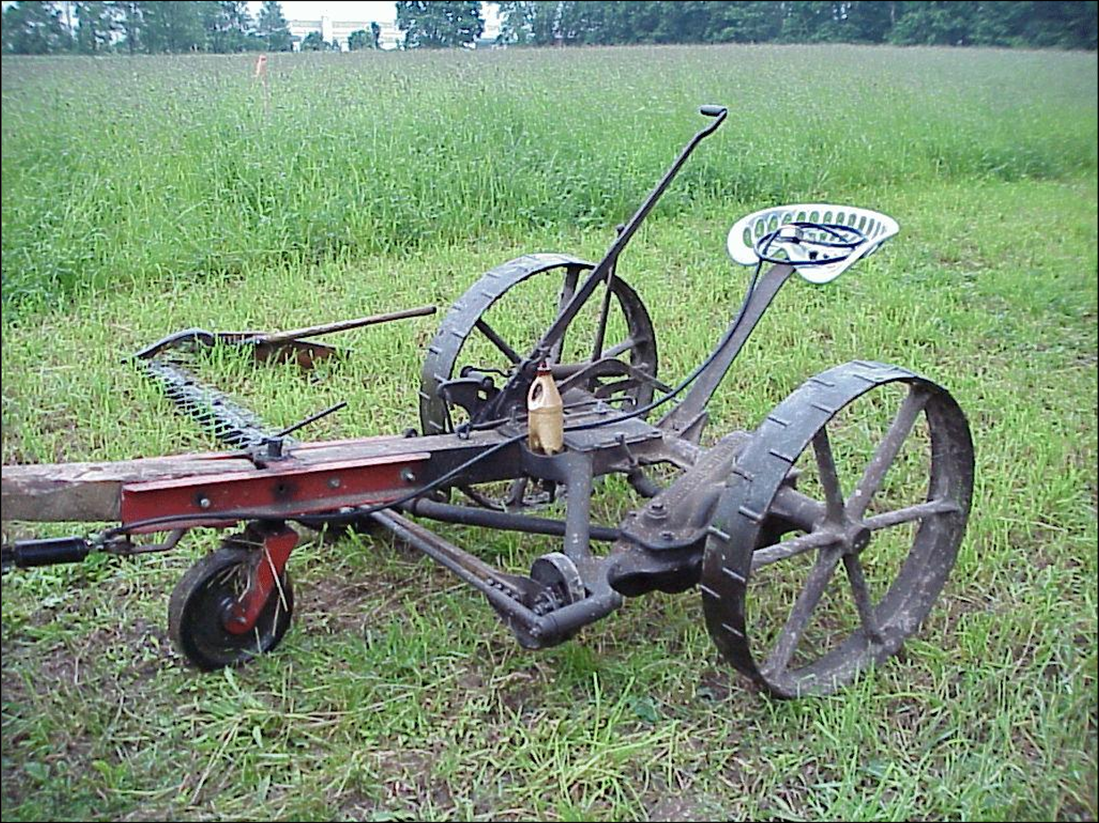 McCormick-Deering #7 mower with a caster wheel for tongue support.