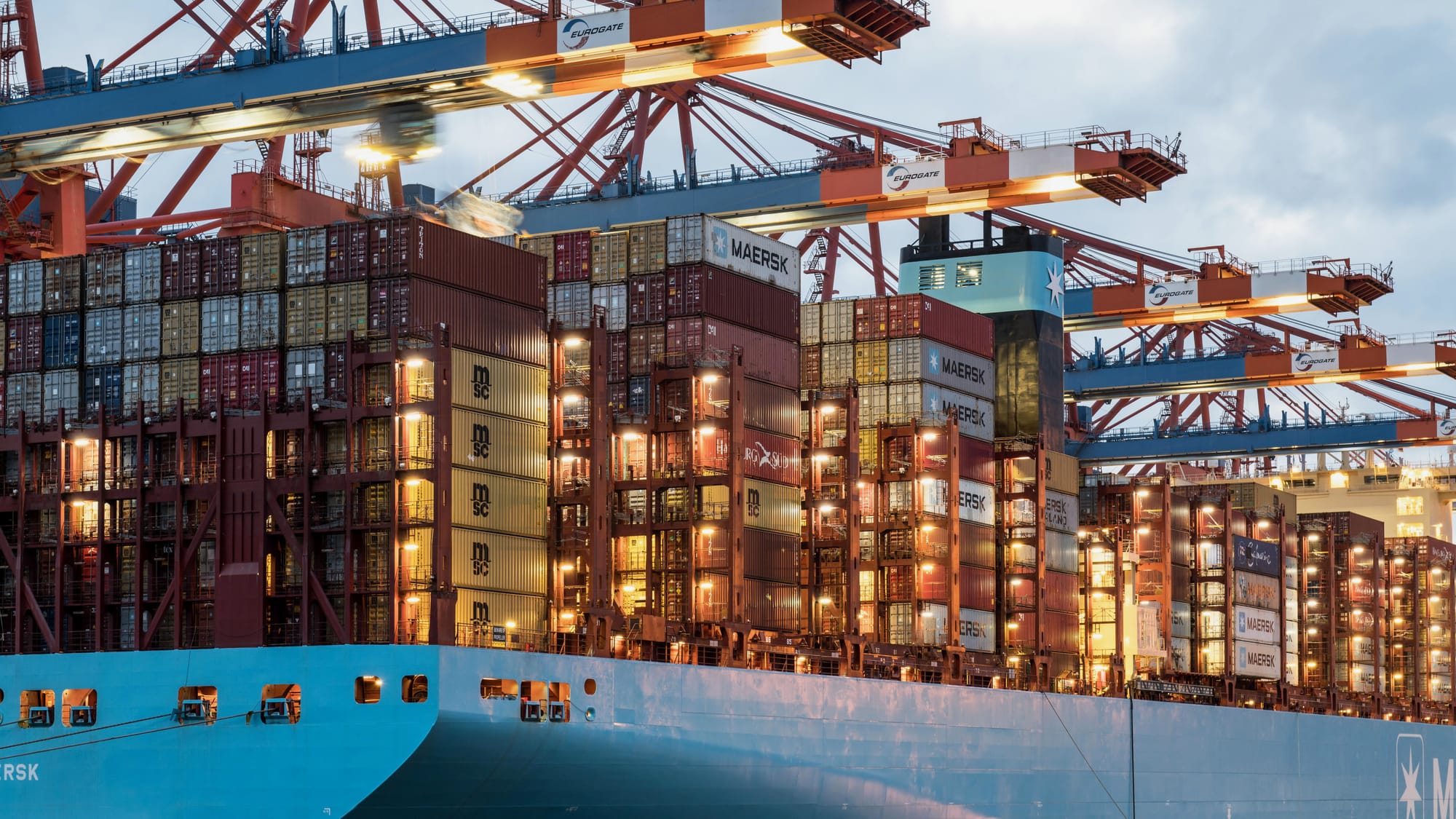 Cargo ship loaded with containers at Hamburg harbor - Photo by Wolfgang Weiser