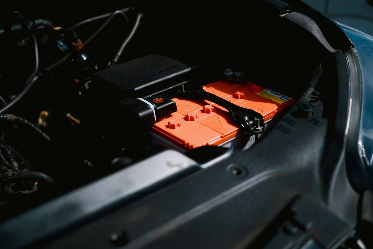 Electric car battery inside a vehicle's engine compartment
