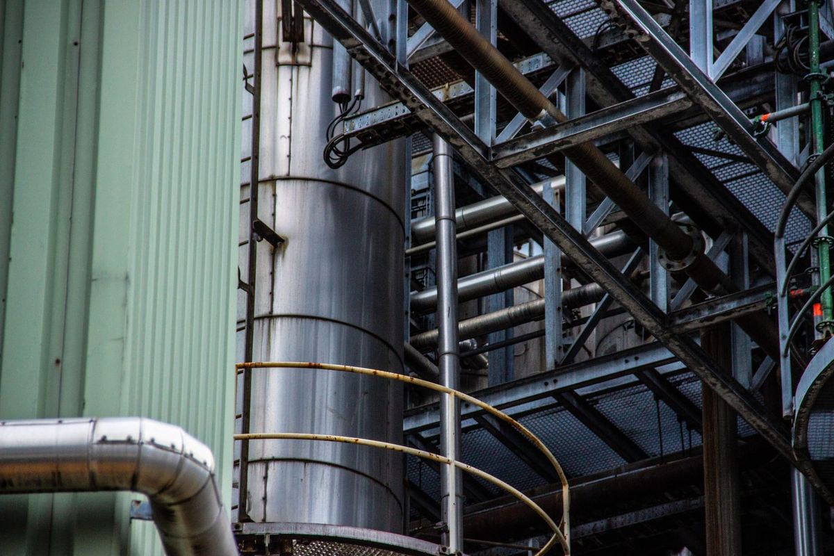 Industrial metal structure with pipes and steel framework