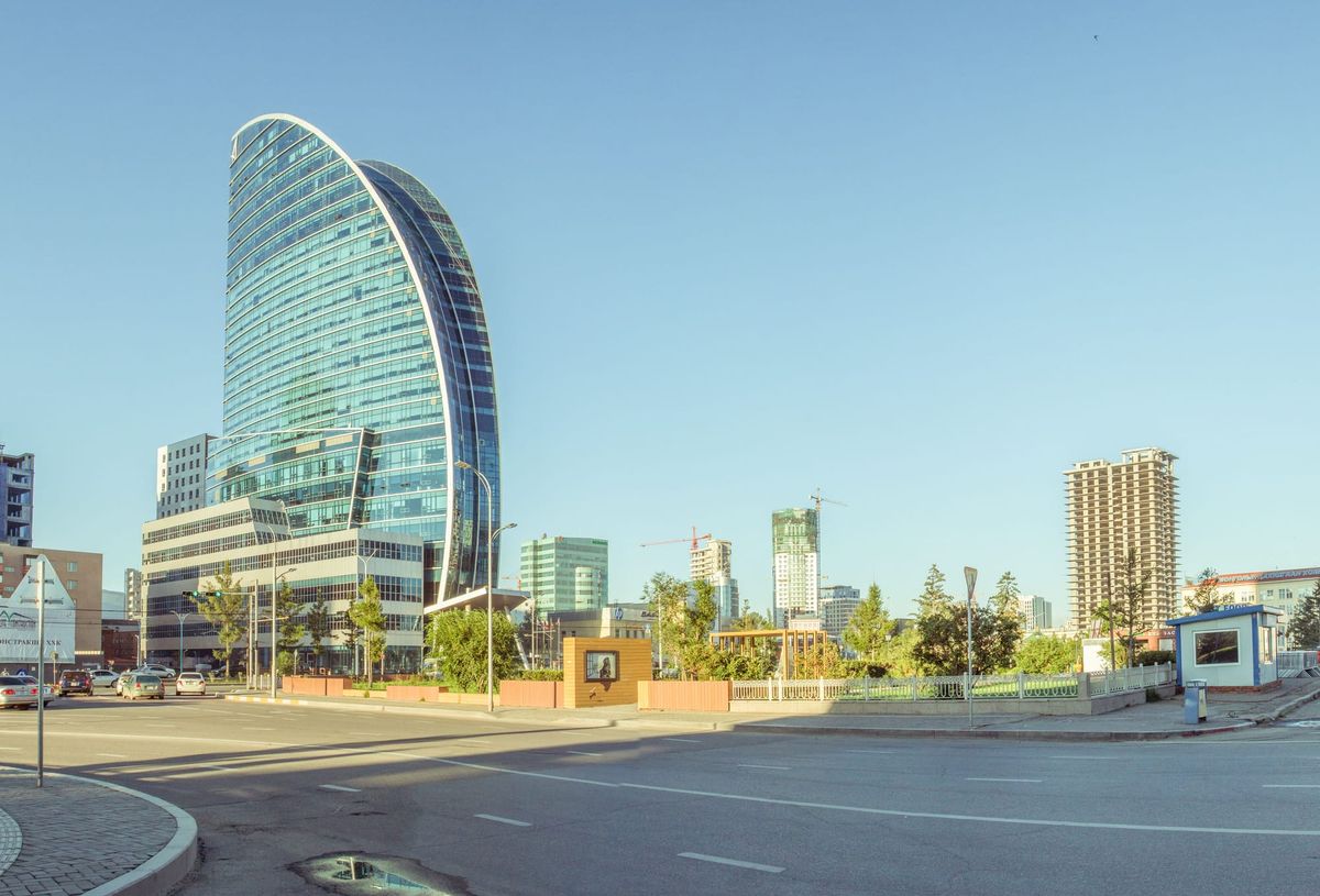 View of modern buildings in Ulaanbaatar, Mongolia with a clear blue sky