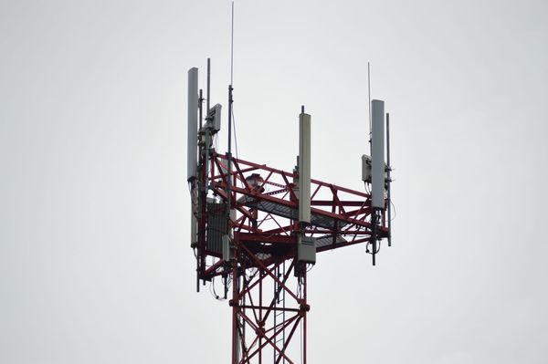 Cellular Radio Tower with Cloudy Background