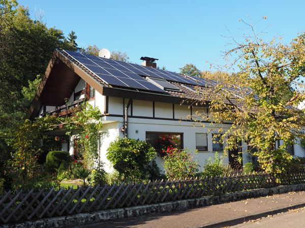 House with Solar Array on Roof - Photo by Hans on Pixabay