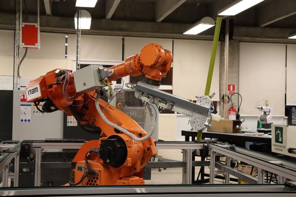 Industrial robotic arm in a lab setting