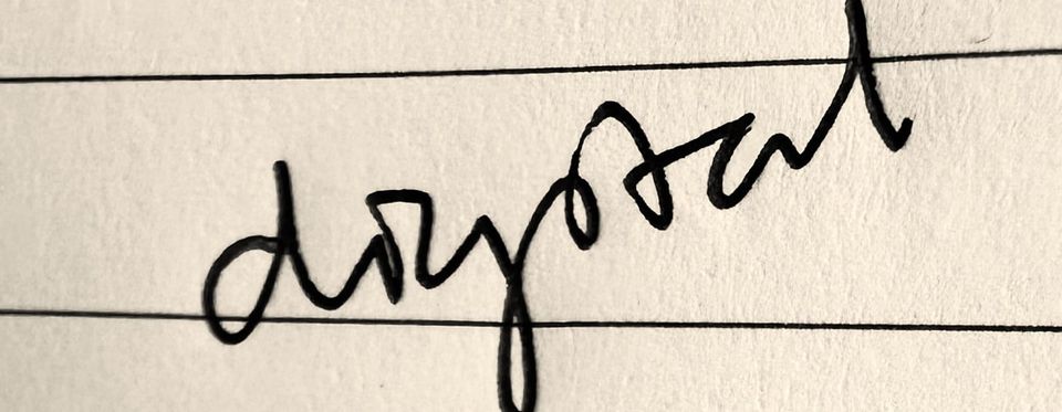 the word 'digital' written in pen.