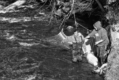 SECURING THEIR ELVER FYKE NET