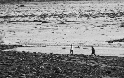 SEARCHING the beaches around Half Moon Cove for Majik Francis were many volunteers, who had been looking since he was lost in the waters on Sunday, November 22. His body was finally recovere
