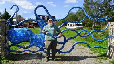 FULLY EMBRACING FALL, Ollie the Octopus on South Lubec Road has turnedmany tourists’ heads on their way to West Quoddy Head Lighthouse. Ollie was created with fiberglass and galvanized steel