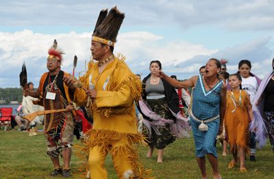 LEADING THE DANCERS following the welcoming ceremony for the chiefs at Split Rock are Dwayne Tomah and Lorene Homan, during the 54th Indian Day celebration at Pleasant Point. (Edward French 
