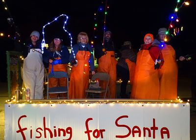 FISHING FOR SANTA are anglers on this float during Lubec’s Festival of Lights parade. The float was sponsored by Dallas Hood and Joanne Case, with the prize money donated to the American Leg
