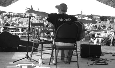 KRISTEN MITCHELL greets the crowd at the main stage at Herring Cove campground during Fogfest on Campobello Island. (J.D. Rule photo)
