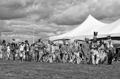 PROCEEDING to the dance field during the Grand March are Indian Day participants at Sipayik. (Don Dunbar photo)