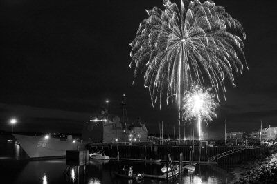 THE FOURTH OF JULY AND CANADA DAY ARE CELEBRATED ALL AROUND THE BAY. Fireworks explode over the U.S.S. San Jacinto on July 5, as part of Eastport's Fourth of July celebration. (Don Dunbar ph