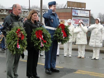 FREEDOM IS NOT FREE. Canadian mothers of the Memorial Cross and the Silver Cross receive wreaths in honor of the service and sacrifice of veterans from the allied nations of Canada and the U