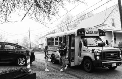 DELIVERING BAGS OF FOOD to area school children every weekday is Dana Bowen, food services director for the Eastport schools. The bags contain lunch and breakfast for students and any siblin