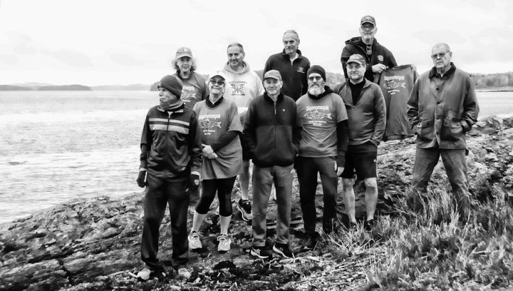 STANDING AT SPLIT ROCK, SIPAYIK, at the start of the 80-mile Alewife Relay Run on May 21 are some of the runners and road crew. In back are (left to right) Janet Hough, Ralph Dana, Jonathan 