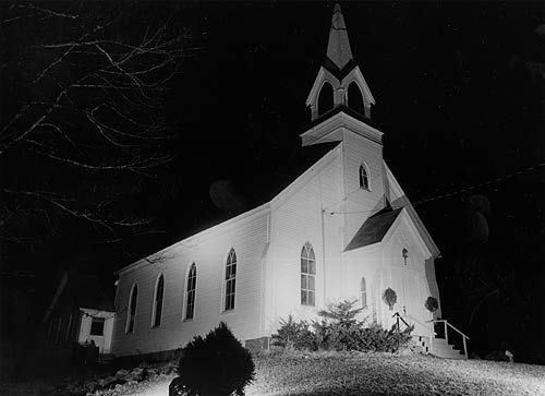 PEACE ON EARTH, GOOD WILL TOWARD MEN. The Perry Congregational Church appears to glow on a cold and still December night just before Christmas. (Edward French photo) Christmas reawakens spir