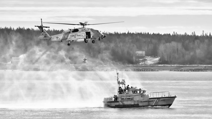 HELICOPTER TRAINING is conducted with U.S. Coast Guard Station Eastport's 47-foot motor lifeboat off Eastport on January 18. (Don Dunbar photo)