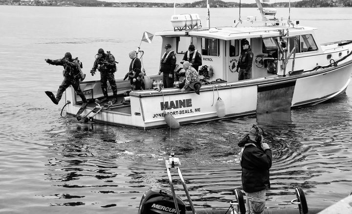 READY TO DIVE IN! The Maine State Police Underwater Recovery Team, which also includes divers from the Maine Marine Patrol, held one of its regular trainings off the Eastport breakwater on A