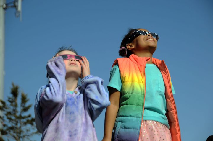 HERE GOES THE SUN! Third through eighth grade students at the Eastport Elementary School were among the thousands in Maine who wore protective eyeglasses and watched the total solar eclipse 